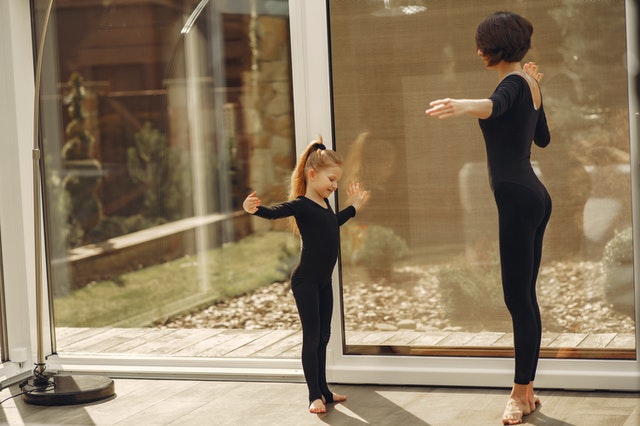 mother and daughter dancing ballet